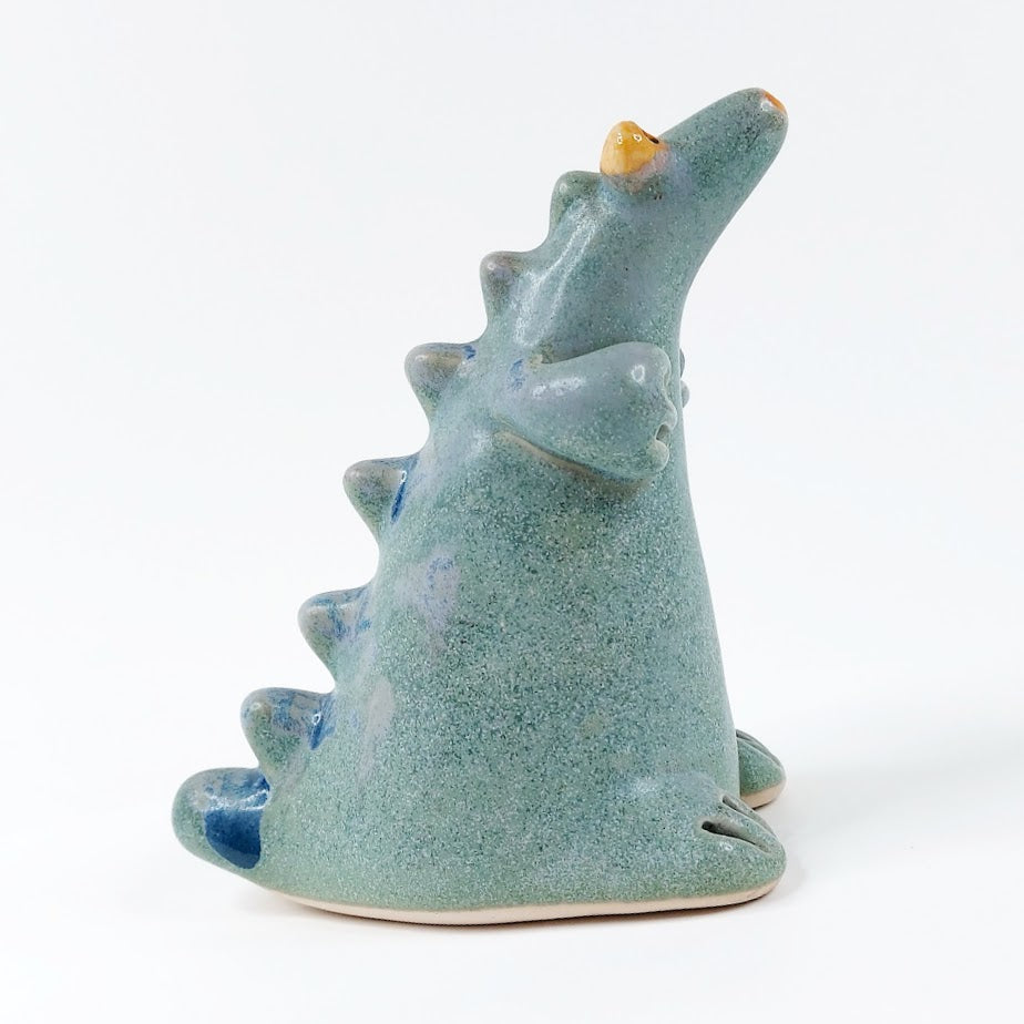 Keraaminen dinosaurus sirotin