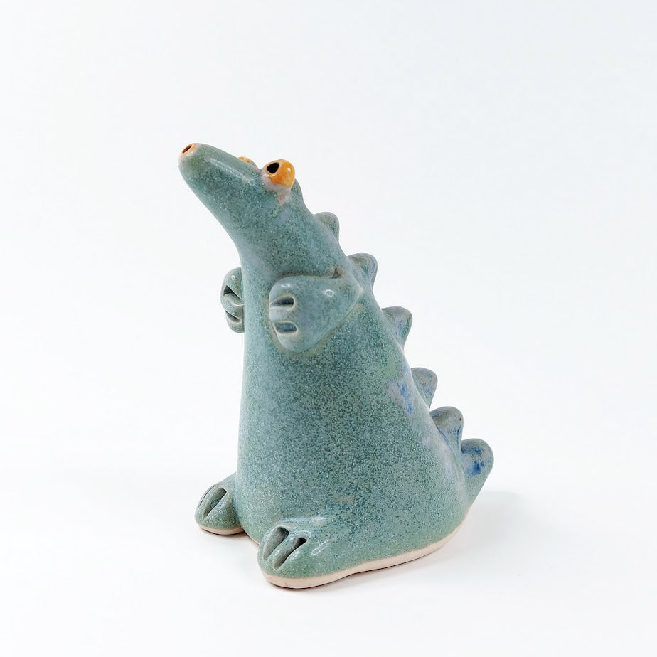 Keraaminen dinosaurus sirotin