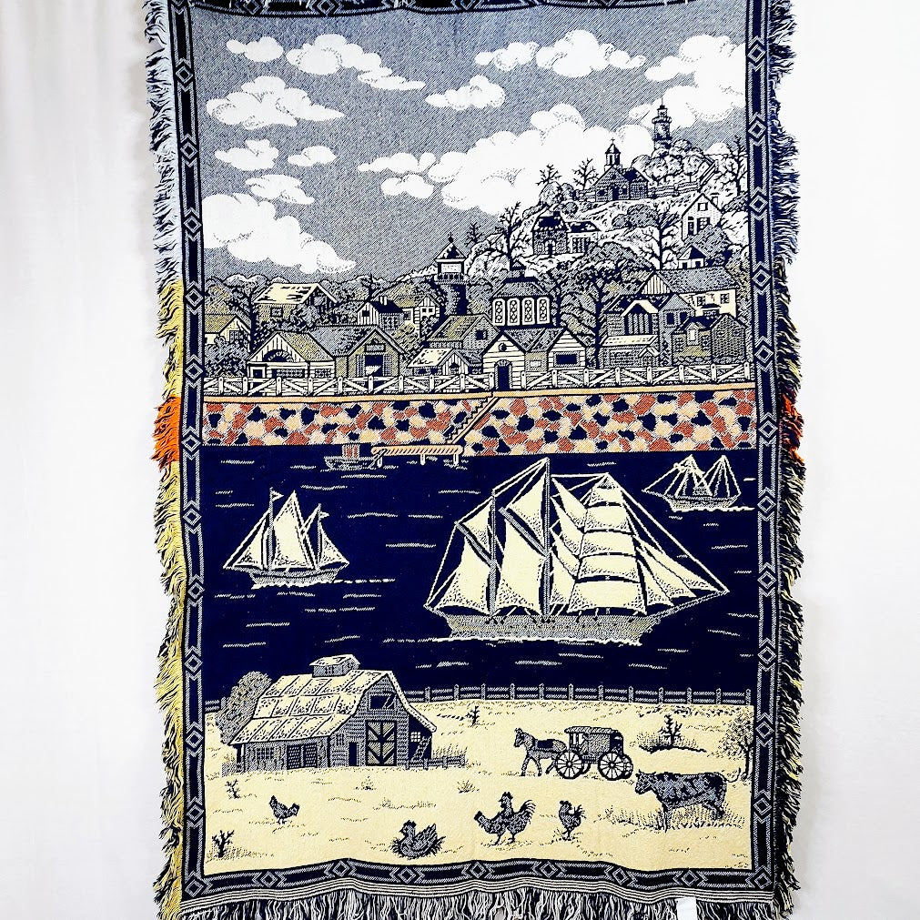 Maalaiskylä ja purjelaivat torkkupeitto 100x150 cm