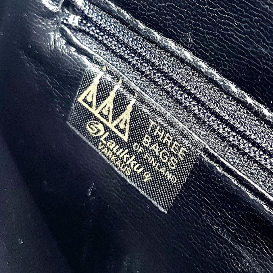 Three Bags vintage nahkalaukku rannehihnalla