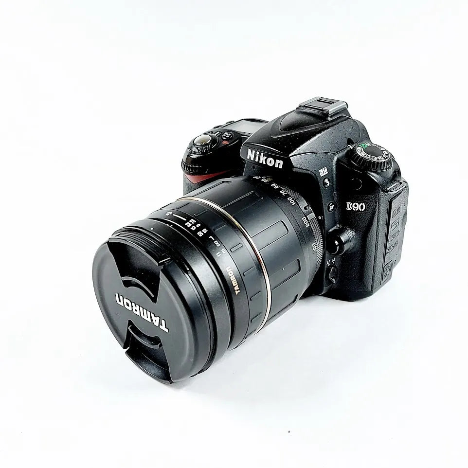 Nikon D90 järjestelmäkamera ja Tamron 28-300 mm objektiivi