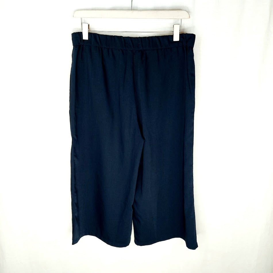 Tom Tailor leveälahkeiset caprihousut koko 42