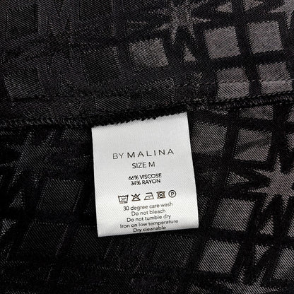 By Malina Frankie mekko koko M