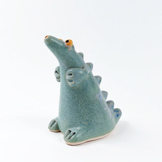 Keraaminen dinosaurus sirotin