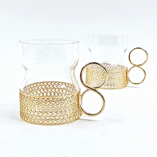 Iittala Tsaikka lasit kullan värisellä pidikkeellä 2kpl