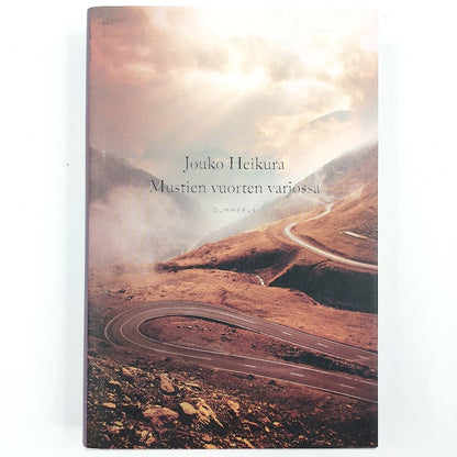 Jouko Heikura: Mustien vuorten varjossa