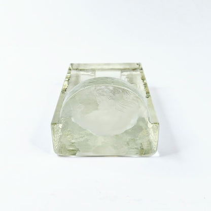 Lasinen lumiukko kynttilälyhty