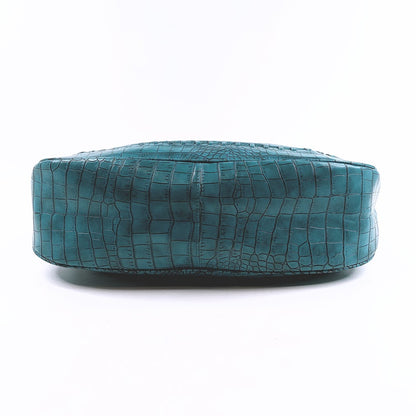 Paris Hilton turkoosi laukku