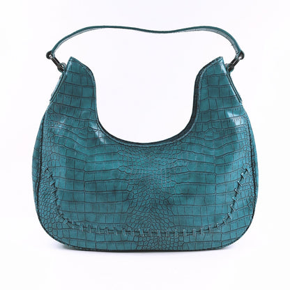 Paris Hilton turkoosi laukku