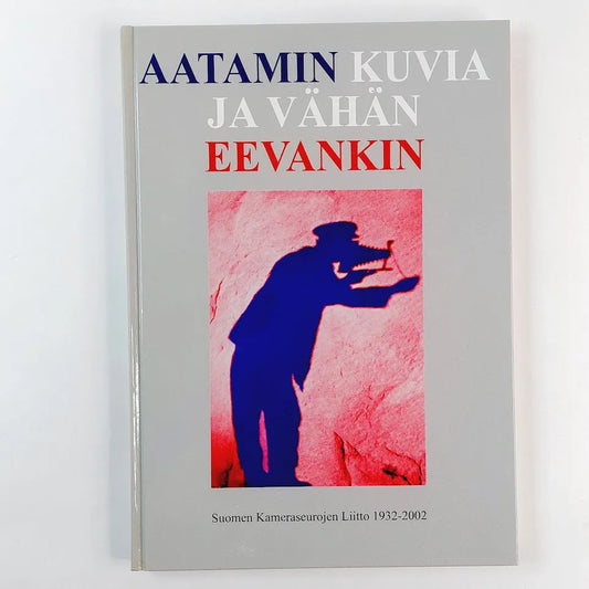 Kirja Aatamin kuvia ja vähän Eevankin