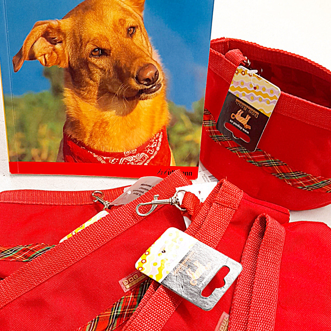 Punaisia koirapussukoita ja koirakirja.